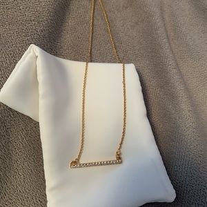 Flat bar gold necklace with diamonds